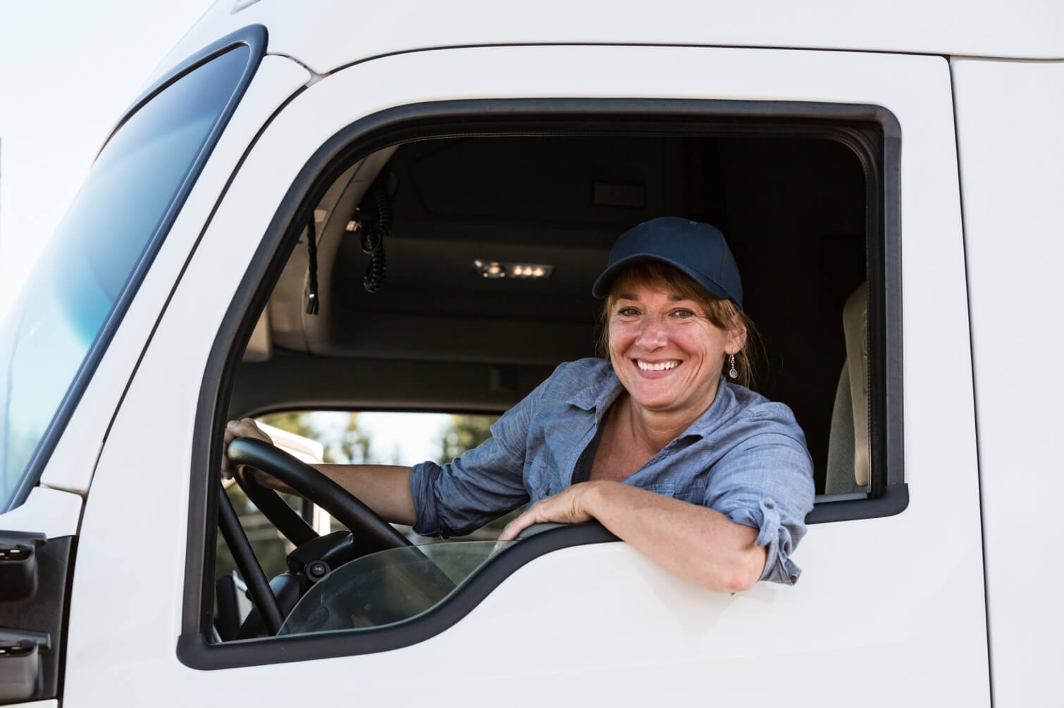 Truck driver saving time and money on truck insurance